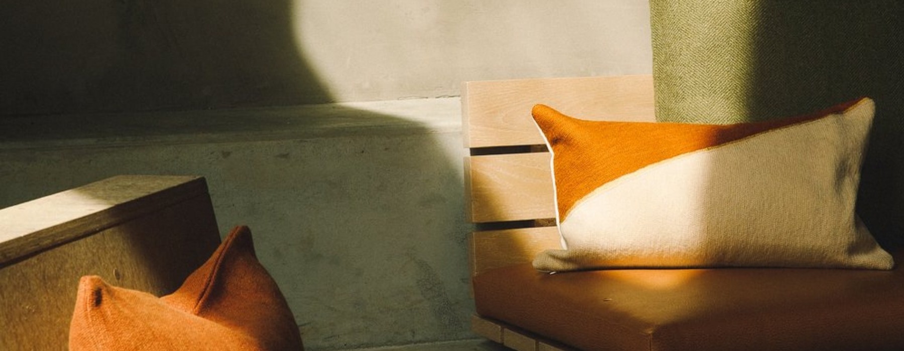 a seating area with pillows