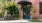 entrance at a brick building with green doors