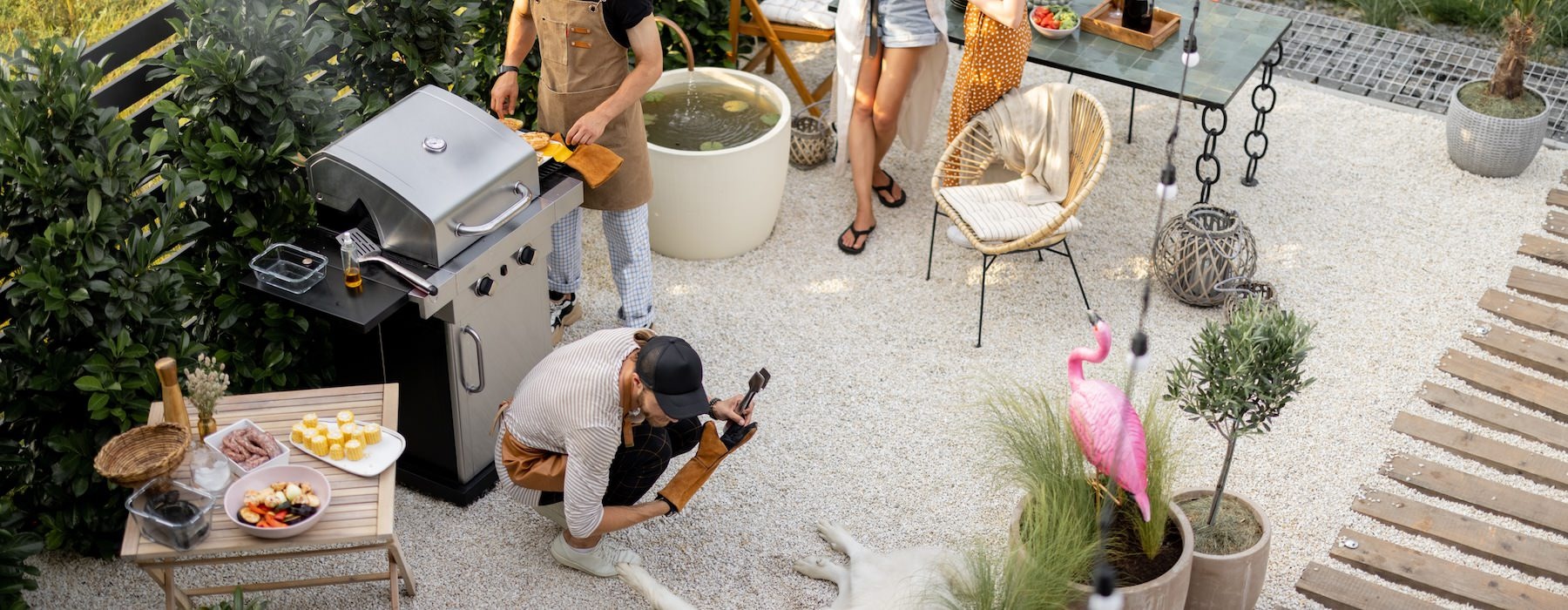 a group of people grilling outdoors